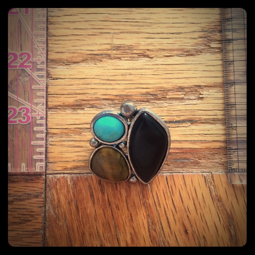 Adjustable stone and metal ring